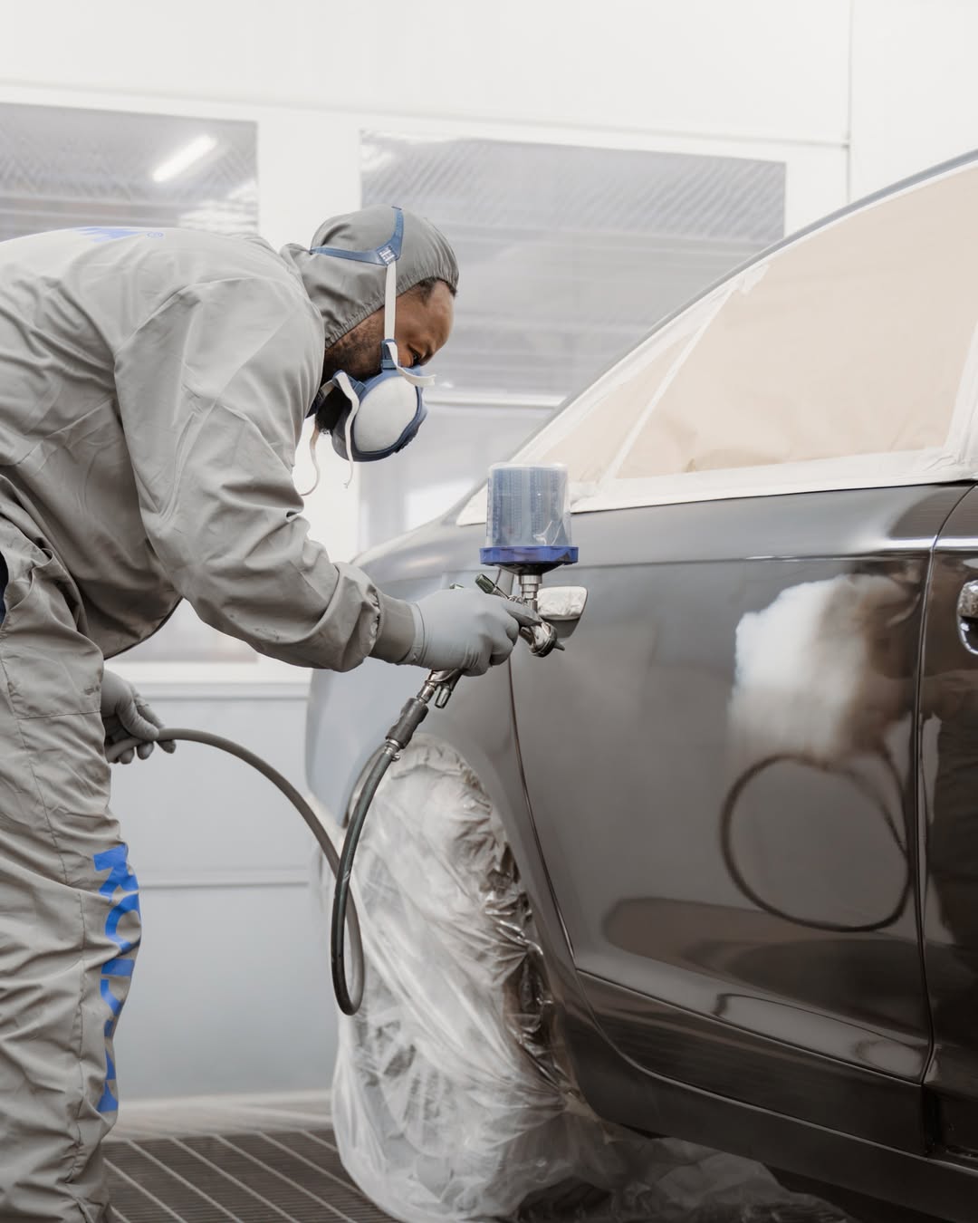 Application de peinture automobile chez D-BOSSTECH